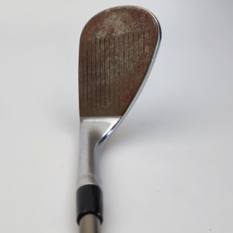 Callaway Jaws Raw Face Chrome 56.0° Sand-Wedge für Damen, Rechtshand, S-Grind (10.0°), mit UST Mamiya Recoil Wedge Std. Graphitschaft in Std. Länge (34.25 Inch), Womens (50.0g), mit LAMKIN ST+2 Soft CHEV, black-silver Std. Griff in Std. Stärke